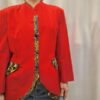 vintage red waisted jacket with details on the pokets,the button line and the waist