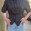 vintage black waisted shirt with accentuated shoulders