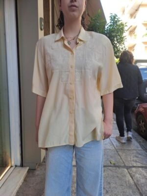 vintage vanilla shirt with white stiched embroidery
