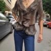 vintage animal print blouse with frills and subtly goldish