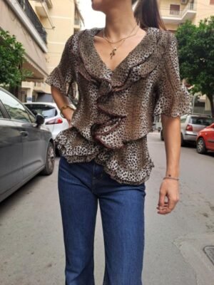 vintage animal print blouse with frills and subtly goldish