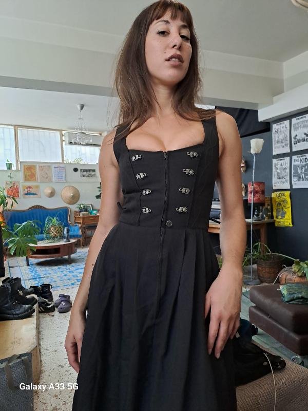 vintage black sleeveless corset style midi dress with metal clasp details and a flared skirt - Image 7
