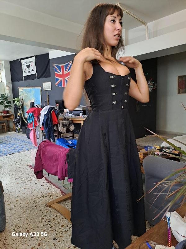 vintage black sleeveless corset style midi dress with metal clasp details and a flared skirt - Image 6
