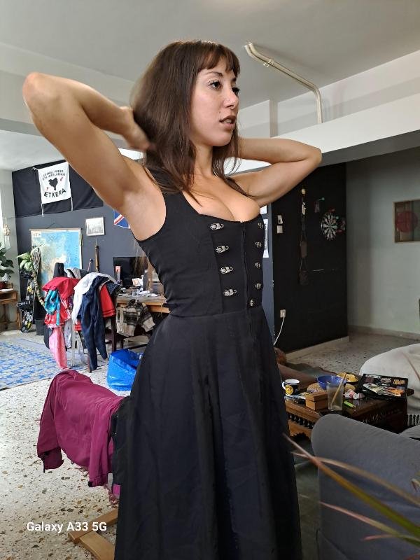 vintage black sleeveless corset style midi dress with metal clasp details and a flared skirt - Image 8
