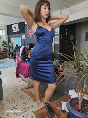 Alternative view of vintage fitted, satin navy blue cocktail dress with spaghetti straps and a fishtail hem