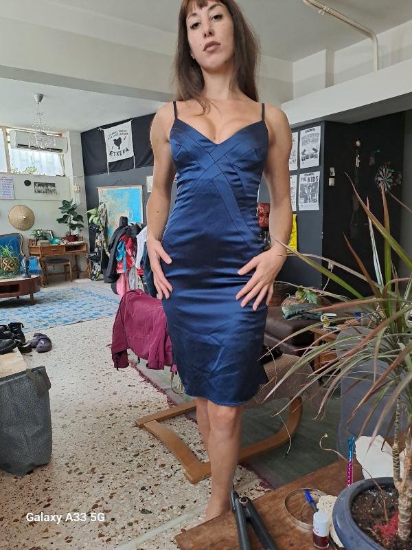 vintage fitted, satin navy blue cocktail dress with spaghetti straps and a fishtail hem
