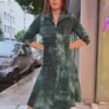 vintage green tie-dye dress with fitted waist and flared skirt