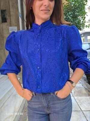 vintage electric blue shirt with subtle leopard jacquard detailing, high neck and puff sleeves
