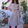 vintage romantic floral midi dress with tie neck detail and loight pleats
