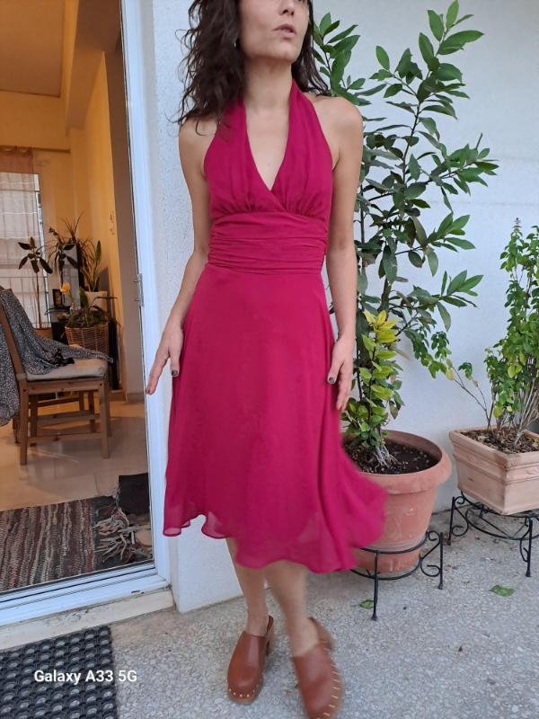 vintage magenda halter dress with fitted waist and flowy skirt