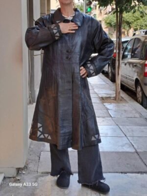 vintage black leather coat with geometric grey insets