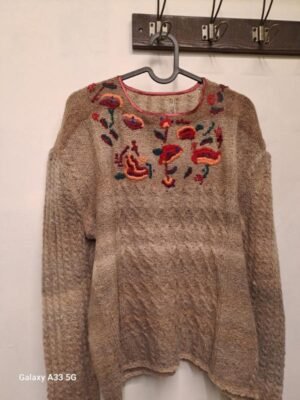 vintage beige hand knitted wool sweater with floral embroidery