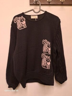 Alternative view of vintage black knitted sweater with metalic squirls and pleated sleeves