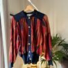 vintage knitted multicolor cardigan buttoned up with pads