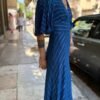 70's vintage blue stripped dress featuring fitted waist, flare skirt and acordeon sleeves