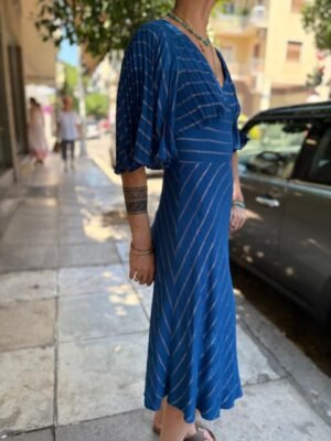 70's vintage blue stripped dress featuring fitted waist, flare skirt and acordeon sleeves