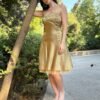 vintage gold strapless dress with petticoat and tie back detail
