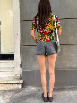 Alternative view of vintage unique colorful abstract patterned top with fitted waist and puff shoulders